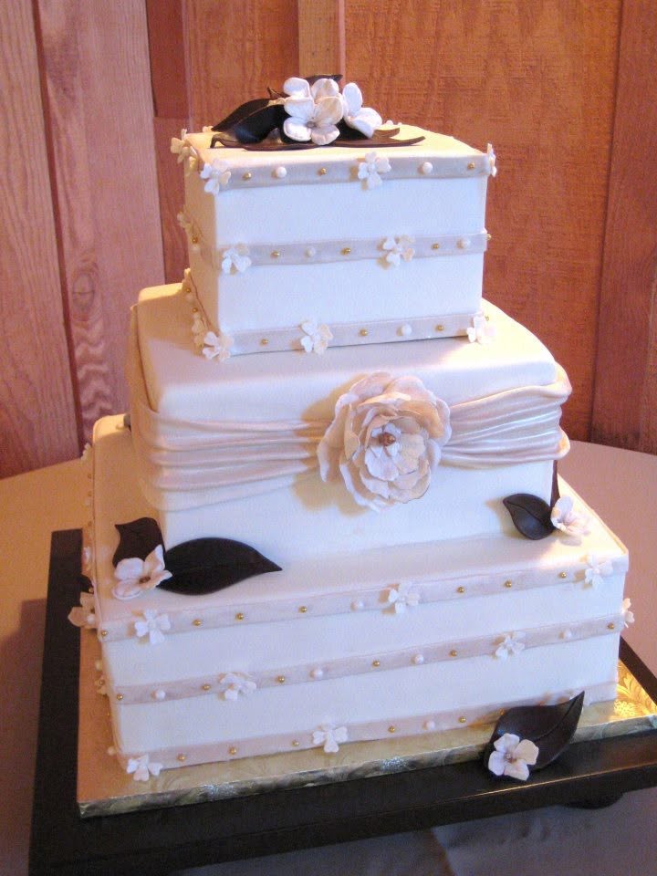 Square tiered cake with pearls and gold beading