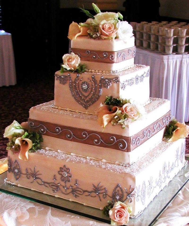 Blush square wedding cake with silver piping and roses